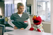 Eliza Coupe (Dr. Denise Mahoney), Elmo.