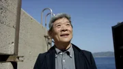 Nagasaki, JAPAN - Mr. Minoru Kinoshita was born and grew up on Hashima Island - once the most densely populated place on Earth. He joined the OSR team to visit his old apartment 50 years after leaving. (photo credit: National Geographic)