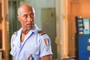 Danny John-Jules (Officer Dwayne Myers).