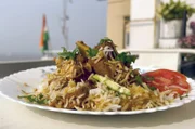 In Neu-Delhi hat Sumit ein Biryani mit Hammelfleisch zubereitet.