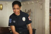 Tommy Vega (Gina Torres).