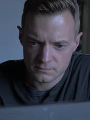 Adam Berry reviews security footage, as seen on Travel Channel’s Kindred Spirits.