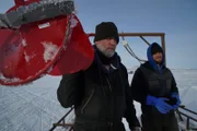 Jason Walker and Bobby Lowe ready to cut through the ice.
