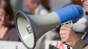 Close up of a megaphone during a demonstration. RAW-file developed with Adobe Lightroom.