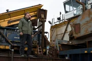Dave Young stands resolute aboard the Myrtle.