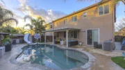 The backyard in this Discovery Bay, CA home may not have water access, but it has a beautiful swimming pool, which may work for homebuyers, Ben and Gina, as seen on HGTV's House Hunters.
