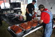 Cookin' With Stump preps their pork.