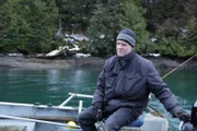 Sam Carlson on his skiff, sets out to find kelp greenling on the waters near his home in Port Protection. (National Geographic/Pedro Delbrey)