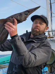 Forrest Galante holding a deep sea species of shark
