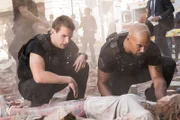 L- R: Jim Street (Alex Russell) and Daniel 'Hondo' Harrelson (Shemar Moore)