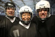 MANCHESTER, UNITED KINGDOM - Paul, Marcia and Alejandro wearing their ice hockey kit after Demo 4. The volunteers have just taken part in a demonstration looking at the expanding universe. They have worked with an ice hockey team, leaf blowers and balloons to figure this challenge out.