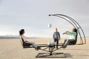 BLACK ROCK DESERT, NEV. - Volunteers; James Fitzsimmons, Joy Ng and CaTamira Babino test the Coreolous Effect machine.