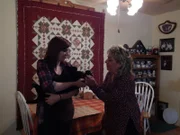 Megan and Kelly with Meki in the dining room.