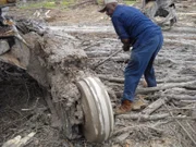 Durley works on the broken loader track.