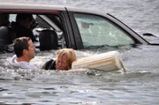 Episode 104 Rattlesnake and Sinking Car. Bear Grylls rescuing one passenger from sinking car.