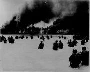 Dargis, Makin Atoll, Gilbert Islands - 165th Infantry assault wave attacking Butaritari, Yellow Beach Two, find it slow going in the coral bottom waters. Japanese machine gun fire from the right flank makes it more difficult for them.