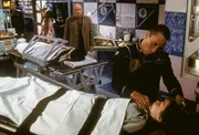 Das Hologramm Franklins (Richard Biggs) entpuppt sich als eiskalter Mediziner, der Experimente an Kindern durchführt.