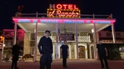 Group photo of Zak and crew in front of hotel