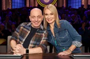 Rateteam-Kapitän Bernhard Hoëcker (l.) mit Moderatorin Britta Hofmann (r.).