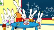 Ferdinand (2.v.r.) feiert in der Klasse mit Simon (3.v.r.), Lou (r.) und den anderen Kindern (l.) und seiner Lehrerin (M.) seinen Geburtstag mit einer leckeren Torte.
