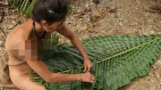 Sara making a mat.