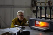 Adam Savage heats his meteorite sword in order to shape it.