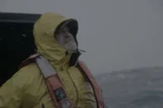 A Wizard deckhand preps the crab pots for Opie season.