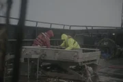 Wizard deckhands sort Opilio crab at the sorting table.