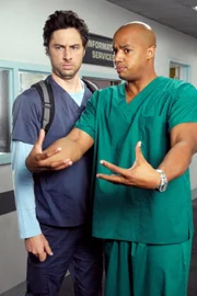 "Scrubs - Die Anfänger", "Mein Finale (1)." J.D.s letzter Tag im Sacred Heart ist angebrochen. Er hat einen neuen Job im St. Vincent Krankenhaus angenommen, um in der Nähe seines Sohnes leben zu können. Obwohl Turk und Elliott sich größte Mühe geben, ihn gebührend zu feiern, ist J.D.s größter Wunsch, von Dr. Cox endlich die Anerkennung zu erhalten, nach der er sich acht lange Jahre lang verzehrt hat.Im Bild (v.li.): Zach Braff (John 'J.D.' Dorian), Donald Faison (Chris Turk).