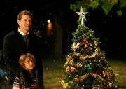 BONES: Booth (David Boreanaz, top) and his son Parker (Ty Panitz, bottom) have a special surprise for Brennan and her family in the BONES episode.