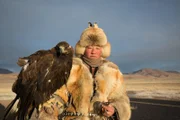 Essen (rear) and a fellow hunter out on the Mongolian steppe. Most hunters are happy when they catch a fox, but it’s said that some legendary have brought down wolves and even snow leopards. An eagle lives for 40 years in captivity - they grow old with their master and form an unshakeable bond. Essen is still young, but he’s training his 17-year-old cousin to join the hunt.