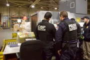 ATECT and HSI officers observe a suspicious cavity seen through x-ray of the elephant table.