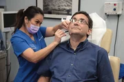 Dr. Lee marks up Lorne Nordstrom's face for the procedure.