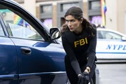 Pictured: Lisette Olivera as Special Agent Sydney Ortiz.