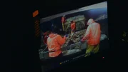 Footage of the crew working.