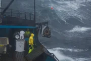 The Summer Bay deckhands hauling gear in rough seas.