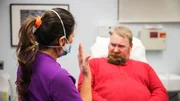 Dr. Lee talks with Dwayne Hobkirk after his procedure.