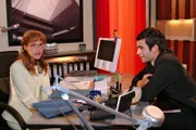 Lisa und David genießen ihre konstruktive Zusammenarbeit.