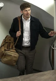 Elias Voit (Zach Gilford)