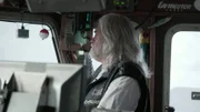 Captain "Wild" Bill Wichrowsky keeps a keen eye out on his crew during rough weather.