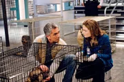 BONES: "The Dog Whisperer" Cesar Millan (L) steps in to help Brennan (Emily Deschanel, R) and Booth when they discover a dog- fighting ring may be connected to the death of a veterinarian in the BONES episode "The Finger in the Nest".
