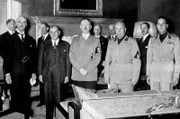 Neville Chamberlain, Édouard Daladier, Adolf Hitler und Benito Mussolini (v.l.) in München am 29. September.