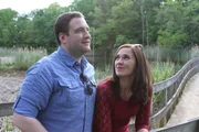 Christine and David standing on a walkway.