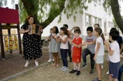 Profimusikerin Celina de Piedade gibt Kindern Musikunterricht, um das Erbe ihrer Vorfahren zu wahren.