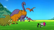 v.li.: Dinosaurier, Robin, Beast Boy, Cyborg, Starfire, Raven