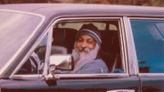 Bhagwan Anfang der 80er-Jahre in einem seiner vielen Rolls Royce