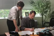 Neil and Stewart are in the office concerned about their accounting/embezzling.