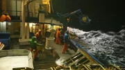 The Northwestern crew is on the deck.