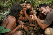 Hazen making a fire with the tribe. (National Geographic/Laurence Hamilton-Baillie)
