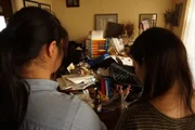 Re-cre actors –Jacqueline & Josephine looking at the messy house